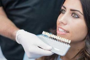 woman looking at veneer options, dental veneers tx