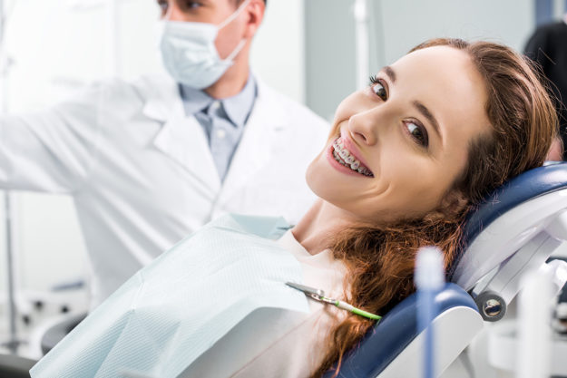 how to prevent teeth shifting (1) patient getting work done to prevent teeth shifting