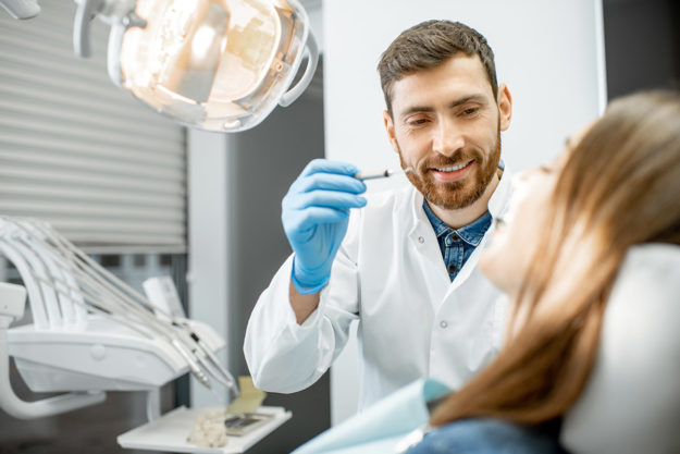 treating a chipped tooth dentist treating a chipped tooth