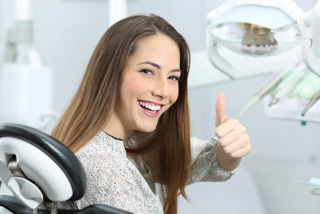 dental health services woman getting dental health services