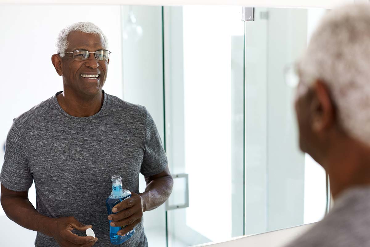 improving-your-dental-hygiene man who is improving his dental hygiene
