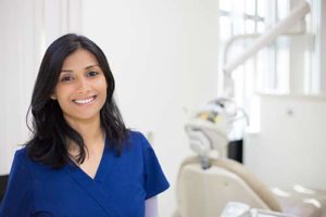 dentist smiling providing preventative dentistry